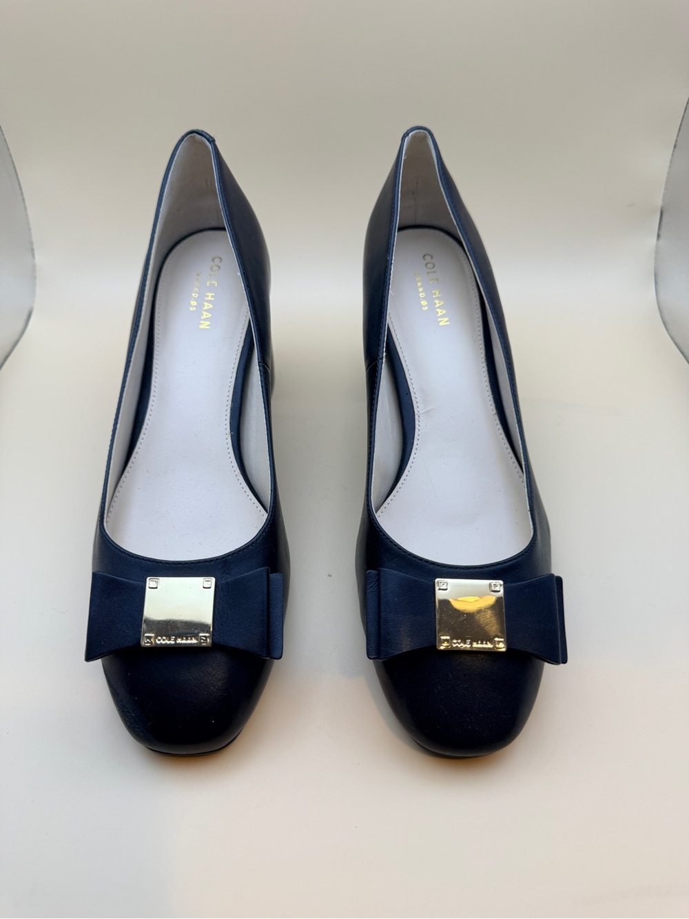 Cole Haan Navy Leather Bow Pumps with Gold Plate